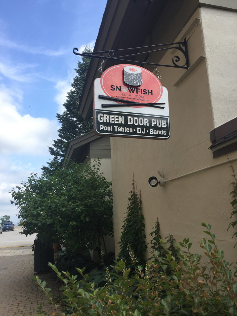 wood carved restaurant sign Stratton vt snowfish sushi