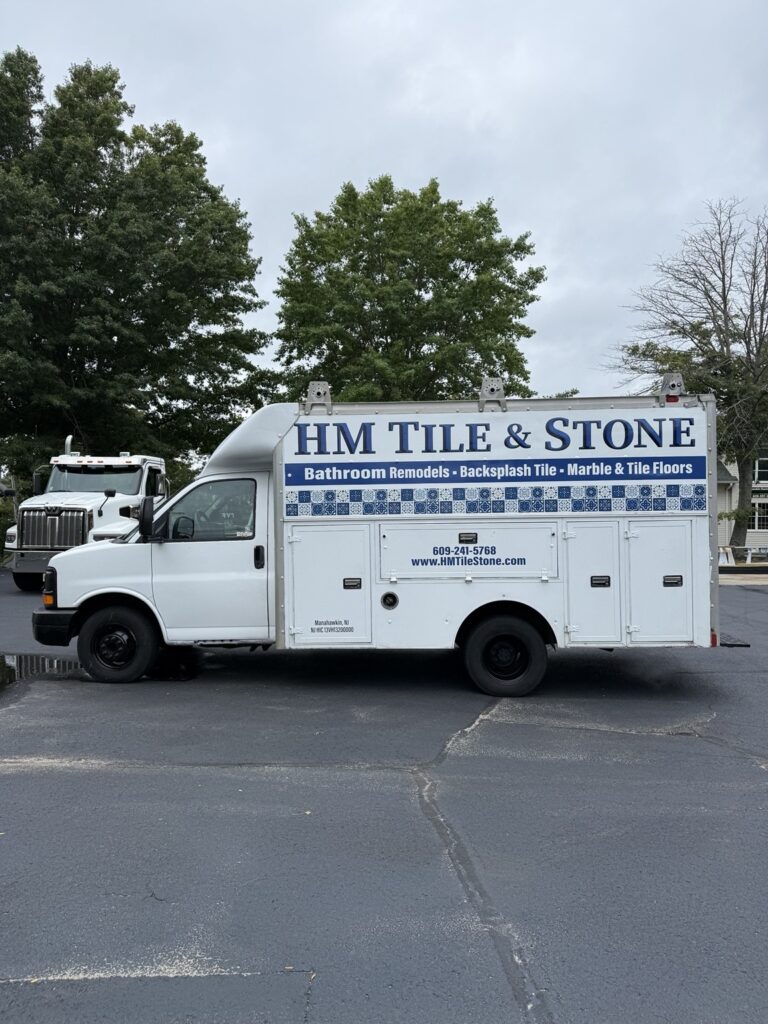 Jim Tile and Stone enclosed trailer lettering